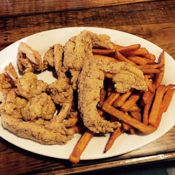 Big Al's Seafood - Half butterfly shrimp half catfish and sweet potato fries. There was more on the plate , but I ate a piece of fish before . - Seafood Near Me - Houma, Louisiana Big Al's Seafood - Half butterfly shrimp half catfish and sweet potato fries. There was more on the plate , but I ate a piece of fish before . - Seafood Near Me - Houma, Louisiana