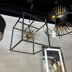 Your Plumbers Crack - Love the mixed metals - Chandeliers with Gold tones and Black