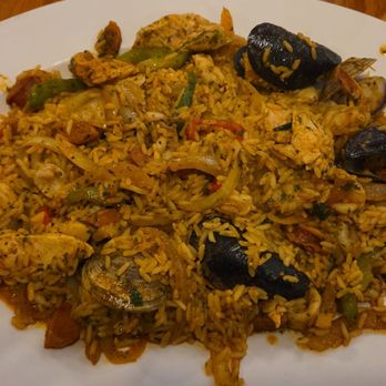 Captain Charlie's Original Reef Grill - paella. ask for the white hot sauce bottle it'll change your life - Seafood Near Me - Juno Beach, Florida Captain Charlie's Original Reef Grill - paella. ask for the white hot sauce bottle it'll change your life - Seafood Near Me - Juno Beach, Florida