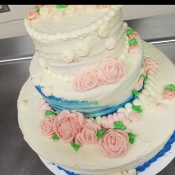 Sweet Success Bakery - a three tiered cake - Desserts Near Me