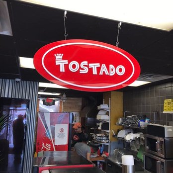 Tostado Sandwich Bar - a man working in the kitchen - Sandwiches Near Me - Jamaica Plain, Massachusetts Tostado Sandwich Bar - a man working in the kitchen - Sandwiches Near Me - Jamaica Plain, Massachusetts