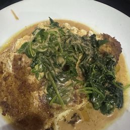 GTs Grouper with Parmesan Cheese Grits and sautéd spinach. GTs Grouper with Parmesan Cheese Grits and sautéd spinach.