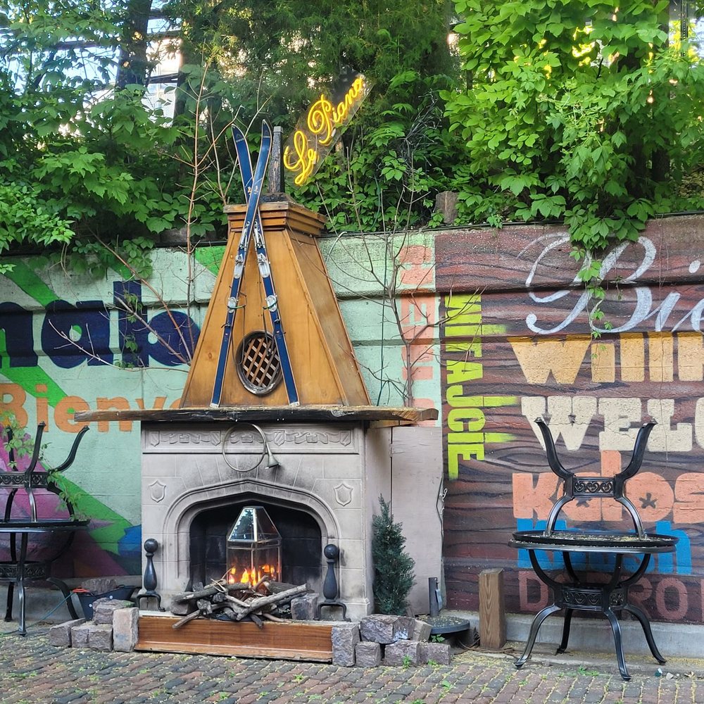 Fireplace near outdoor seats Fireplace near outdoor seats