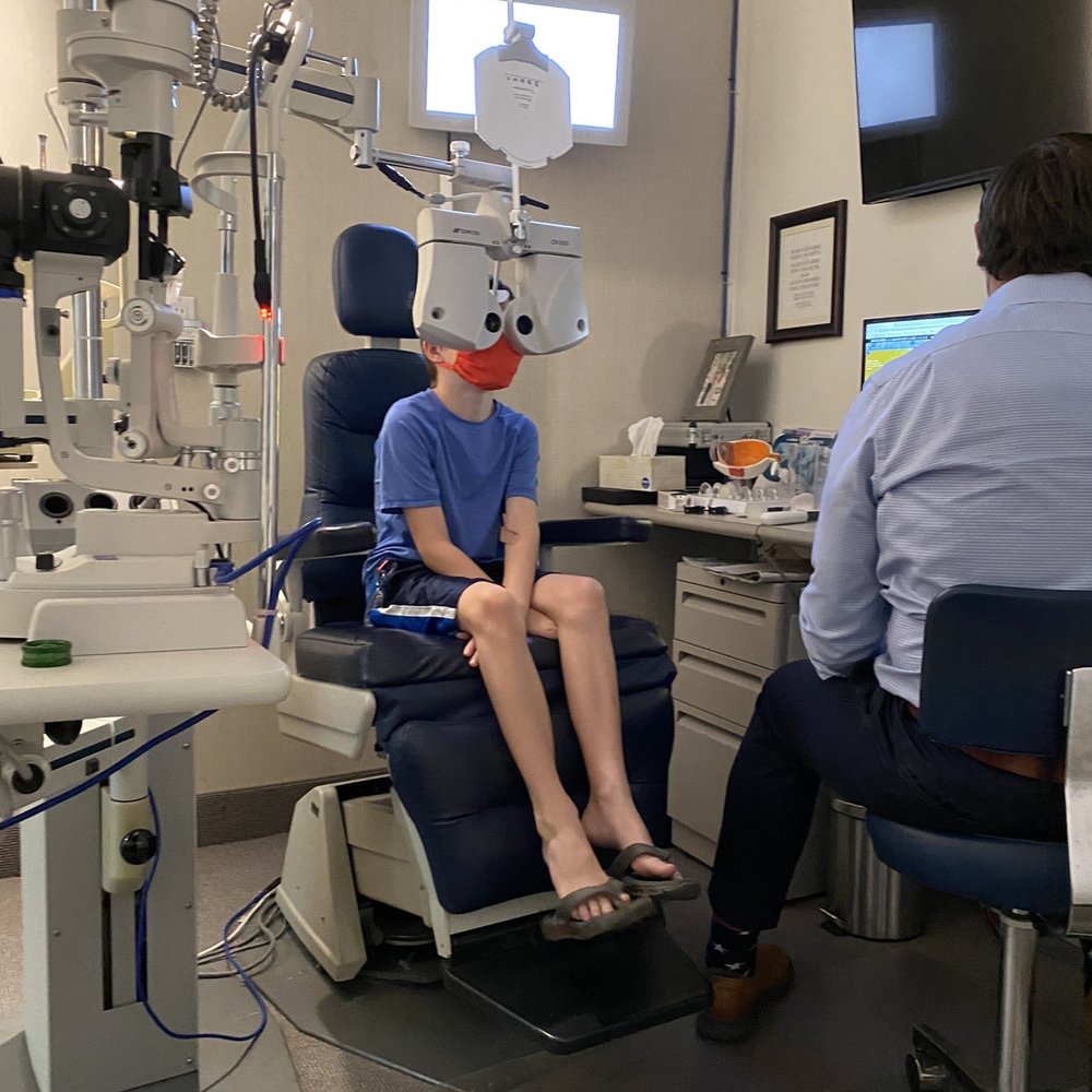 My son getting his exam with Dr. Downs. My son getting his exam with Dr. Downs.