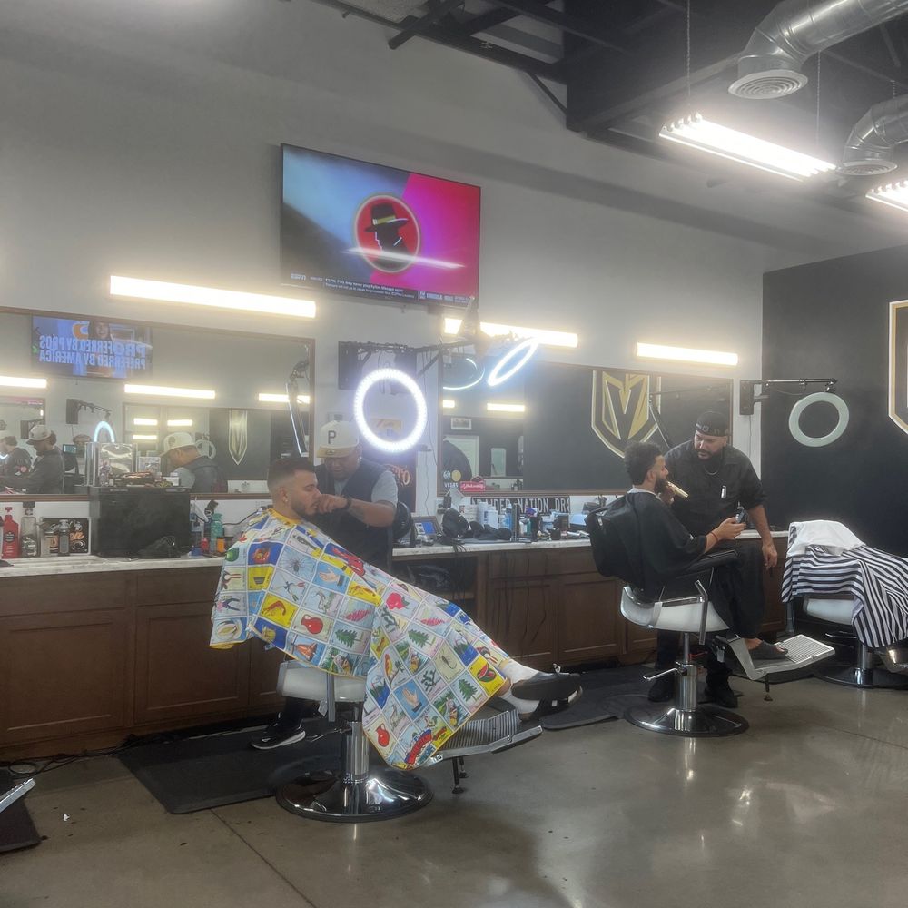 Barbers cutting hair Barbers cutting hair