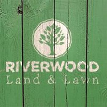 Riverwood Land and Lawn - the logo on a wooden fence - Landscaping Near Me Riverwood Land and Lawn - the logo on a wooden fence - Landscaping Near Me