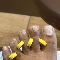 Heavenly Nails - This is the final results of him fixing his work, it is just as bad as the first service. My whole morning was wasted.