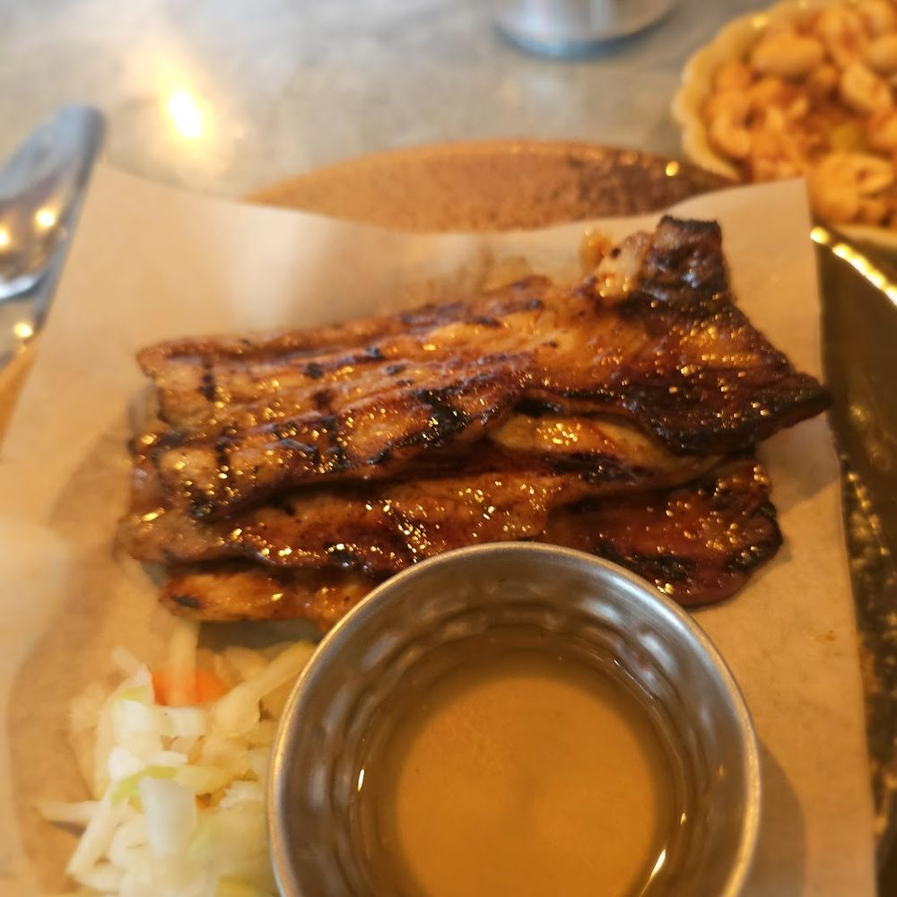 Naks - Inihaw na Liempo- lemon soda bbq pork belly, citrus-soy glaze, and banana ketchup. $16. A bit chewy unfortunately. OK - Filipino Near Me - New York, New York Naks - Inihaw na Liempo- lemon soda bbq pork belly, citrus-soy glaze, and banana ketchup. $16. A bit chewy unfortunately. OK - Filipino Near Me - New York, New York