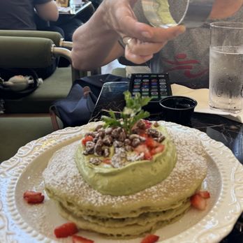 Whisper - Matcha pancakes with matcha cream sauce with candied pecans running over the pancakes - Breakfast & Brunch Near Me - San Mateo, California Whisper - Matcha pancakes with matcha cream sauce with candied pecans running over the pancakes - Breakfast & Brunch Near Me - San Mateo, California