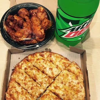 Mountain Mike's Pizza - Garlic bread and dozen wings - Pizza Near Me - Chino, California Mountain Mike's Pizza - Garlic bread and dozen wings - Pizza Near Me - Chino, California