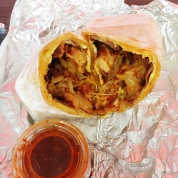 Donut Nation & Estrella Bakery - Bacon and Chorizo burrito. Double yum. - Bakeries Near Me - Bakersfield, California Donut Nation & Estrella Bakery - Bacon and Chorizo burrito. Double yum. - Bakeries Near Me - Bakersfield, California