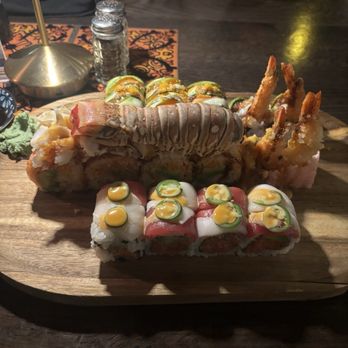 The 698 - Kiss of Fire Roll (near), Angry Lobster Roll (middle) - Sushi Bars Near Me - Columbus, Ohio