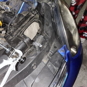 Pit Stop Auto Service - Shows one or two bolts that were holding my whole bumper in place on one side - Auto Repair Near Me - San Bruno, California