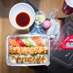 Rainbow Roll, Angry Salmon, and Eel Dragon Roll to go