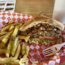 A magnificent burger with weenies and chili beans. Delicioso! A magnificent burger with weenies and chili beans. Delicioso!