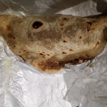 Laredo Taco Company - a burrito wrapped in foil - Tacos Near Me - George West, Texas