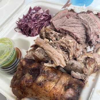 L.A. Brisket - Hawai'i Bowl: A sampler of their chicken, pork and brisket atop a bed of rice, a side of slaw, and some salsa verde and bbq sauce. - Smokehouse Near Me - Honolulu, Hawaii L.A. Brisket - Hawai'i Bowl: A sampler of their chicken, pork and brisket atop a bed of rice, a side of slaw, and some salsa verde and bbq sauce. - Smokehouse Near Me - Honolulu, Hawaii