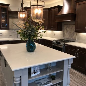 Radigan Remodeling & Design - a kitchen with a center island - General Contractors Near Me - Salem, Oregon Radigan Remodeling & Design - a kitchen with a center island - General Contractors Near Me - Salem, Oregon