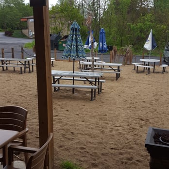 Paradise Pub - picnic tables and umbrellas on the beach - Burgers Near Me - Monaca, Pennsylvania