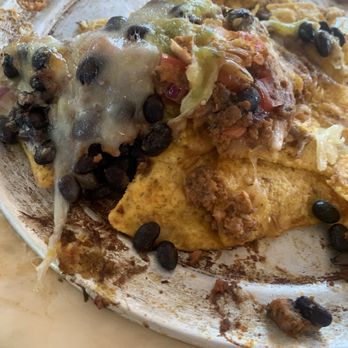 Beer Run - Whats left of small nachos with beef and beans. Delicious! - New American Near Me - Charlottesville, Virginia