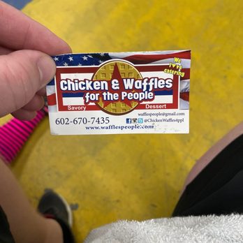 Chicken and Waffles For The People - a person holding a sticker - Food Trucks Near Me Chicken and Waffles For The People - a person holding a sticker - Food Trucks Near Me
