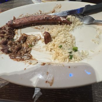 Razzoo's Cajun Cafe - Andouille Sausage over Red Beans N Rice - Cajun/Creole Near Me - Lewisville, Texas