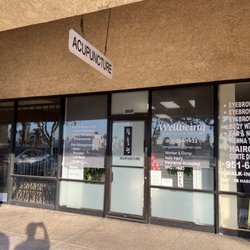 Wellbeing Acupuncture & Herbs - Outside of the clinic, in Food4Less shopping Center, next to Domino's