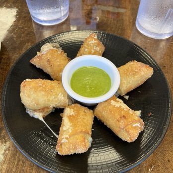 Oli's Kitchen - Philly Cheese Egg Rolls $8.99 - Breakfast & Brunch Near Me - Honolulu, Hawaii Oli's Kitchen - Philly Cheese Egg Rolls $8.99 - Breakfast & Brunch Near Me - Honolulu, Hawaii