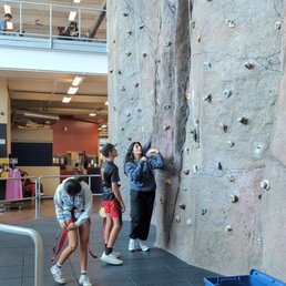 Nice rock climbing wall for kids up front.