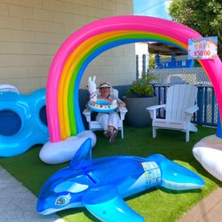 Don Johnson's Pool & Spa - Happy Customer taking in all the pool toys DJPS has to offer!