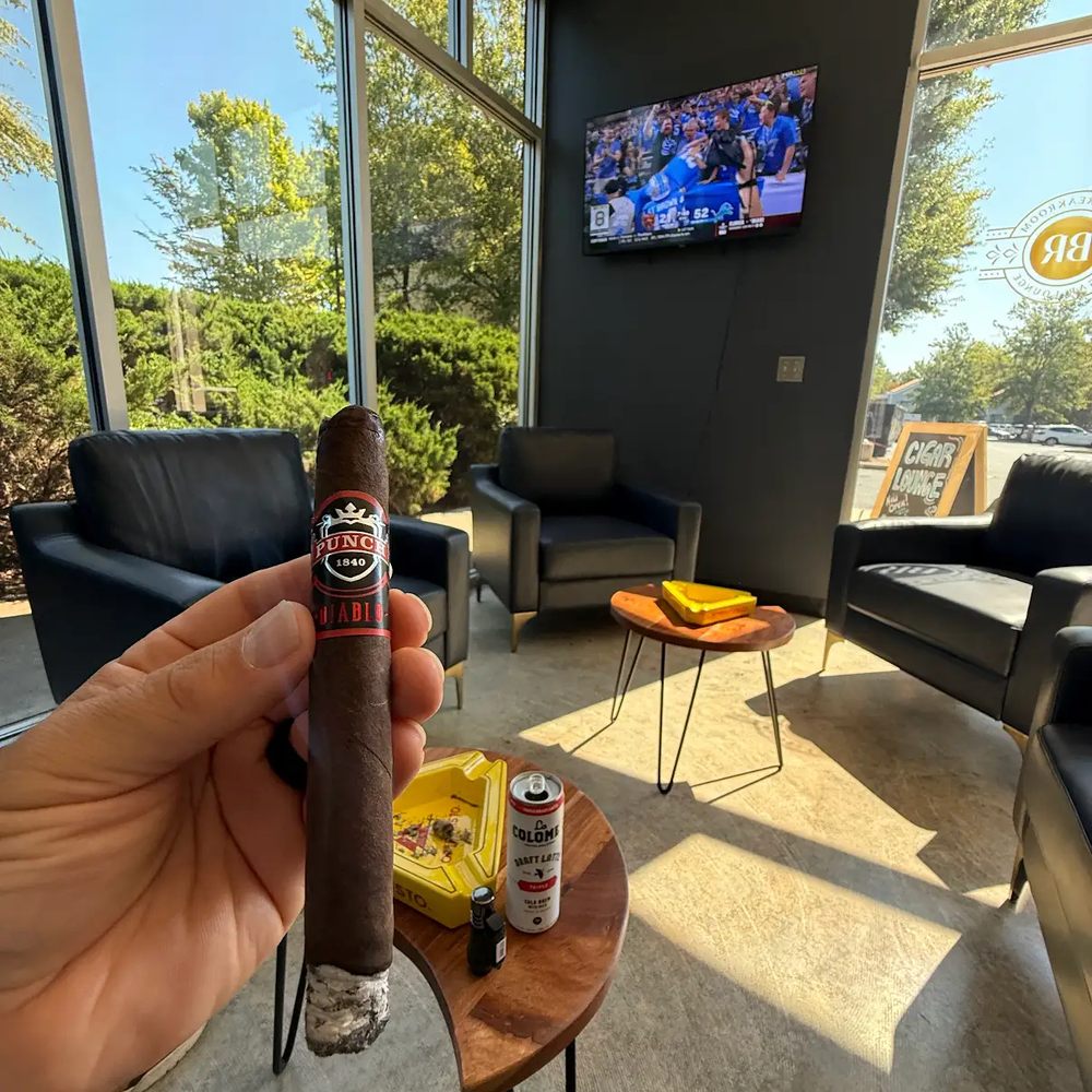 The Breakroom Cigar Lounge - Me enjoying a new cigar, watching football and a drinking a coffee beverage. - Tobacco Shops Near Me - Fort Mill, South Carolina The Breakroom Cigar Lounge - Me enjoying a new cigar, watching football and a drinking a coffee beverage. - Tobacco Shops Near Me - Fort Mill, South Carolina