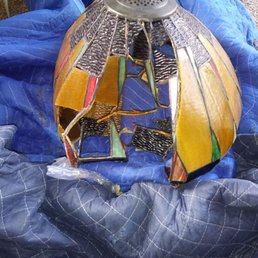 This is my broken lamp I paid special packing for. I am going Better Business Bureau m9ved N Miami to TN This is my broken lamp I paid special packing for. I am going Better Business Bureau m9ved N Miami to TN