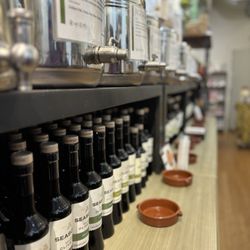 Seasons Olive Oil & Vinegar Taproom - Wall of Olive Oils!