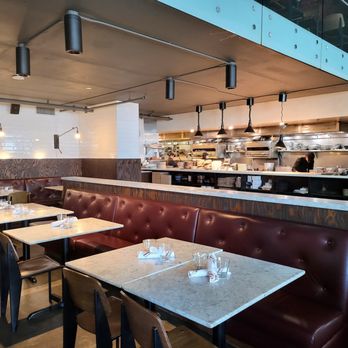 Trattoria by Italian Kitchen - a restaurant with tables and chairs - Italian Near Me - Burnaby, British Columbia Trattoria by Italian Kitchen - a restaurant with tables and chairs - Italian Near Me - Burnaby, British Columbia