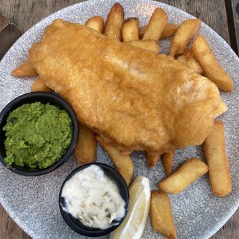 Palmer Arms - Beer battered fish with crushed peas and chunky chips - Pubs Near Me - Windsor, WNM