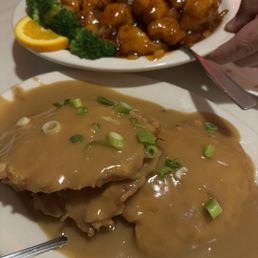 Orange Chicken and Shrimp Egg Foo Young. Orange Chicken and Shrimp Egg Foo Young.