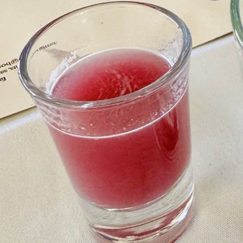 Bosforo - Complimentary pre-dinner cleansing shot (pineapple juice, ginger, hibiscus tea) - Turkish Near Me - San Diego, California