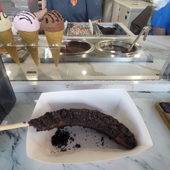 Sugar 'n Spice - Frozen banana with oreo topping and regular chocolate $8 - Ice Cream & Frozen Yogurt Near Me - Newport Beach, California Sugar 'n Spice - Frozen banana with oreo topping and regular chocolate $8 - Ice Cream & Frozen Yogurt Near Me - Newport Beach, California