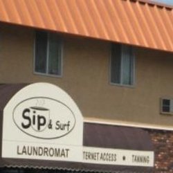 The Laundry Room - Sip & Surf Laundromat & Tanning