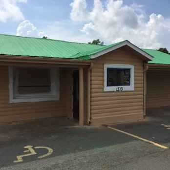The Spot - a tan building with a green roof - Sports Bars Near Me - Monroe, North Carolina The Spot - a tan building with a green roof - Sports Bars Near Me - Monroe, North Carolina