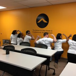 The School of Real Estate and Professional Development - Students very excited to pass their broker's exam!