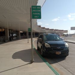 Bengoa's Taxi Checker Cab - Lubbock Preston Smith International Airport Green curb taxi lane. 806-317-9877 / 806-790-9842