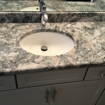 Keystone Granite - sink and mirror in bathroom - Countertop Installation Near Me - Fletcher, North Carolina