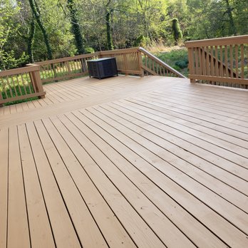 Rose's Contracting - a deck with a grill on it - Flooring Near Me Rose's Contracting - a deck with a grill on it - Flooring Near Me