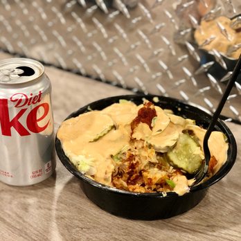 Slappin Chick - Hicksville - a can of diet coke and a bowl of food - Chicken Shop Near Me - Hicksville, New York