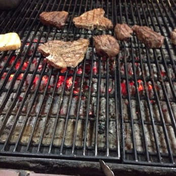 Alexander's Steakhouse - Cooking your own steak - Steakhouses Near Me - Peoria, Illinois