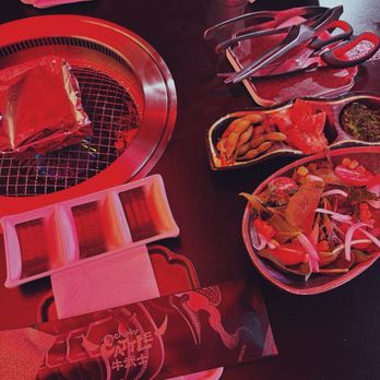 Chubby Cattle - Prepackaged eating utensils and side dishes - cheese corn heating on the grill - Barbeque Near Me - Chicago, Illinois