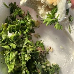 Oasis Mediterranean Cuisine - Tabbouli was not chopped fine, dry w/no flavor but crunchy. I added garlic & lime juice in for some taste so this picture was taken after.