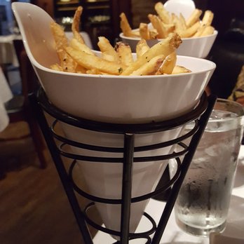 Spencer's For Steaks & Chops - French Fries with sea salt, garlic-parmesan and  fine herbs - Steakhouses Near Me - Omaha, Nebraska
