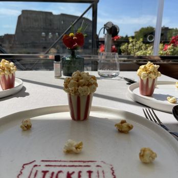 Aroma - Caramel covered popcorn and salted caramel ice cream with an incredible view of the Colosseum (Flavian Amphitheater). - Italian Near Me - Rome, RM